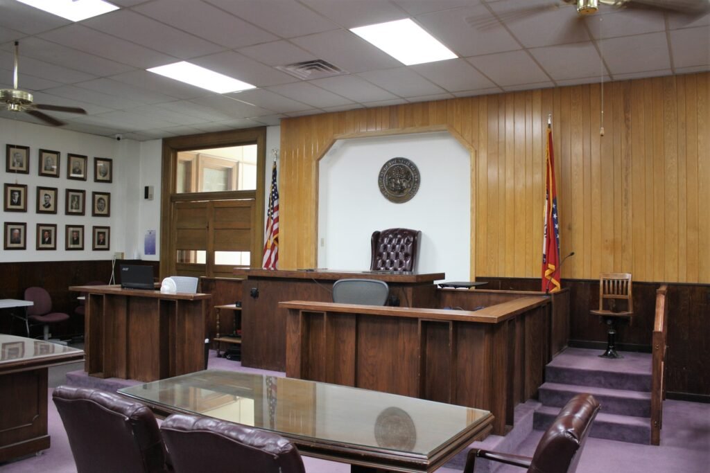 Abortion and Crime Empty courtroom in the Boone County Courthouse in Harrison, Arkansas, with the judge's bench and counsel tables.