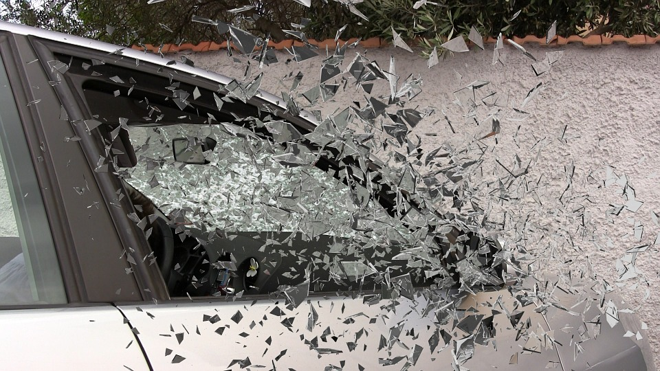 Dehumanization: Can We Rationally Deny The Unborn Personhood? A car window shattering into fragments.